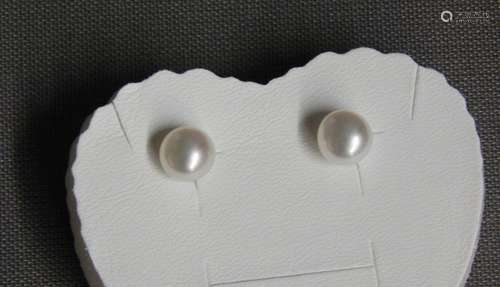 Pair of stud earrings with