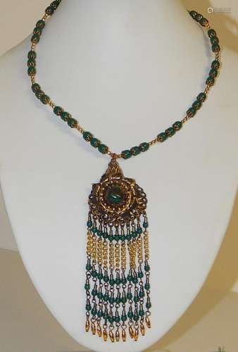 Necklace with green beads,