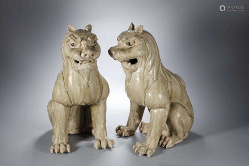 Pair of Celadon Glaze Pottery of Lions