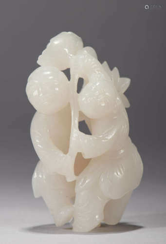 Carved White Jade Boy Holding Lotus