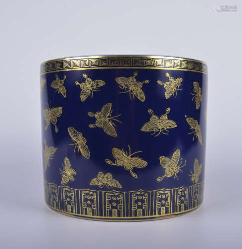 A blue glazed 'butterflies' pen container painting in gold