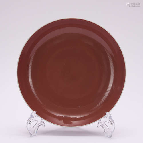 A red-glazed dish