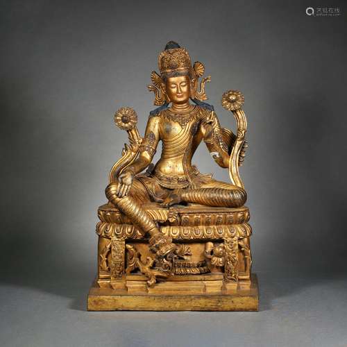 A gilt-bronze statue of Tara