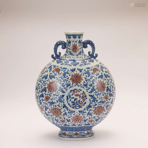 An underglaze-blue and copper-red glazed 'floral' moonflask