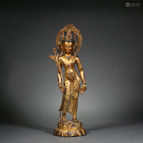 A gilt-bronze statue of Padmapani