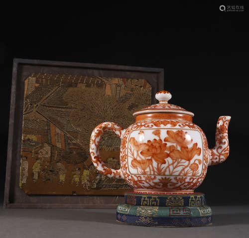 An allite red glazed 'floral and poems ' teapot