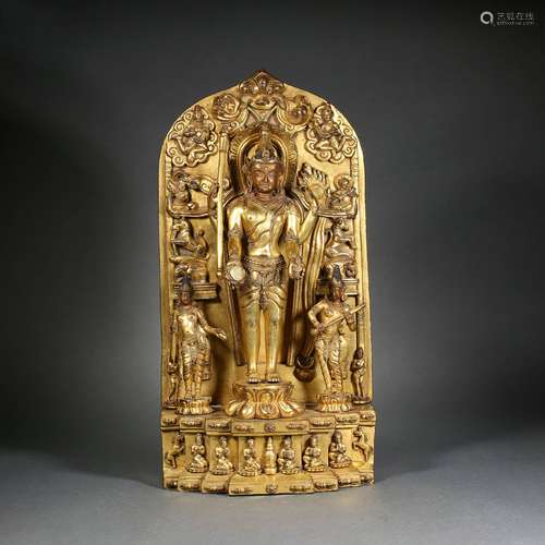 A gilt-bronze statue of Padmapani