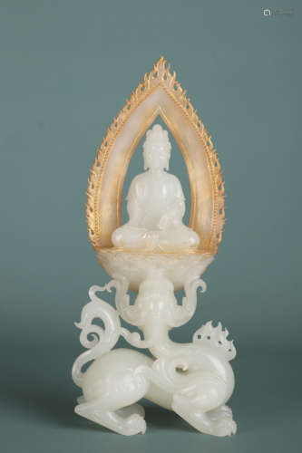 A jade statue of Avalokitesvara with backed cloud