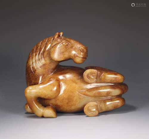 A jade horse shaped ornament