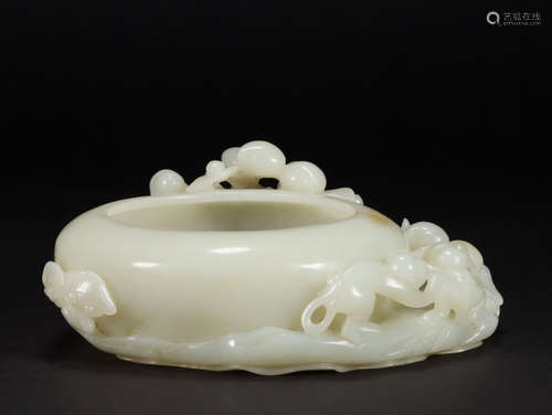 A hetian jade 'monkey offering birthday congratulations' was...