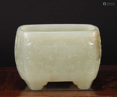 A hetian jade 'beast' square washer