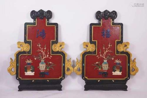 A Pair of Lacquered Ornament