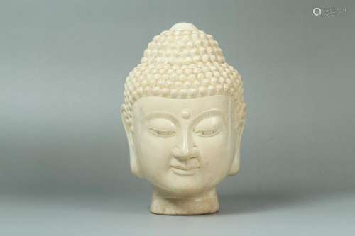 A Carved Stone Buddha Head