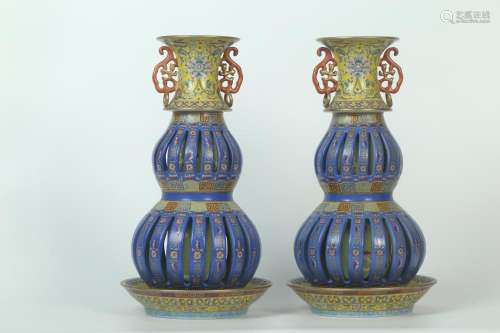 A Pair of Porcelain Candle Stick Holders
