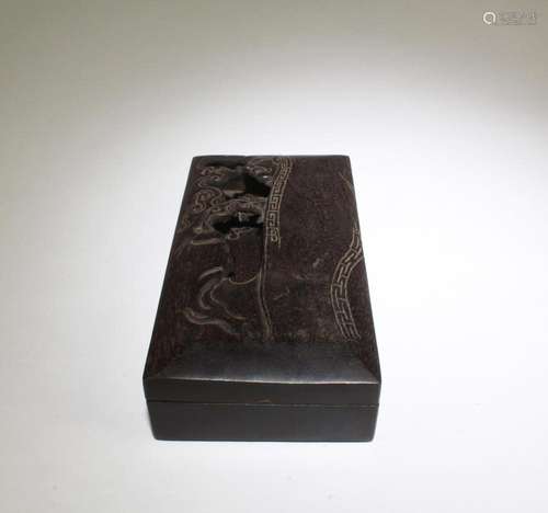 A CARVED WOODEN INK STICK