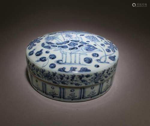 A BLUE & WHITE ROUND CONTAINER