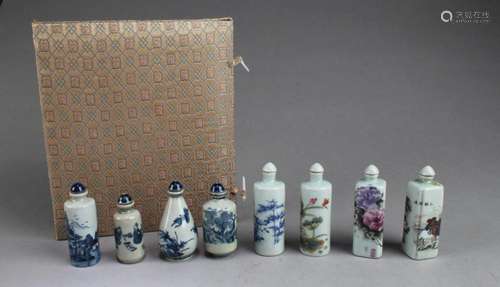 A BOX OF EIGHT CHINESE PORCELAIN SNUFF BOTTLE