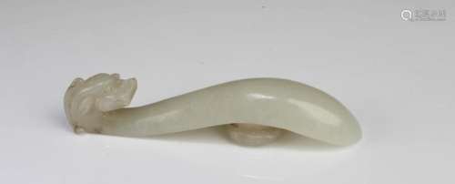 A CARVED JADE BELT HOOK