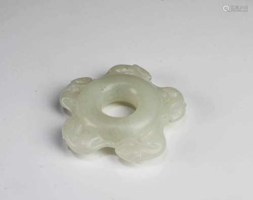 A STAR SHAPED JADE PENDANT