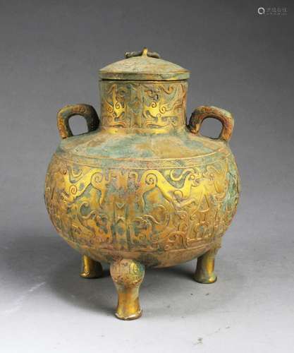 A BRONZE TRIPOD JAR WITH LID