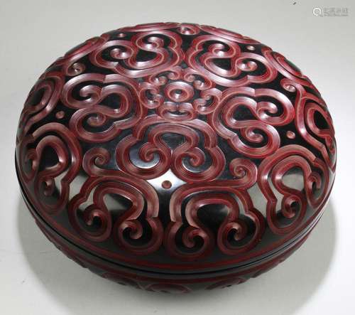 A ROUND CINNABAR LACQUER BOX