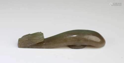 A CARVED JADE BELT HOOK