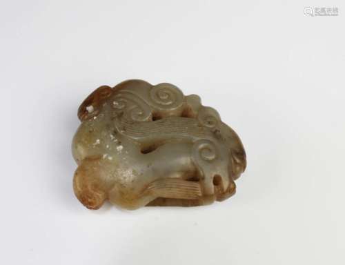 A CARVED JADE ORNAMENT