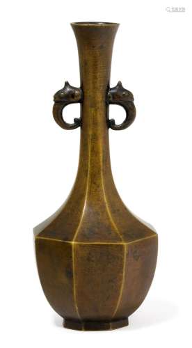 A SMALL FACETED BRONZE VASE.Japan, 19th c. Height 14.8 cm.Of...