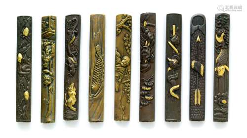 NINE KOZUKA (KNIFE HANDLES).Japan, 18th/19th c. Length of ea...