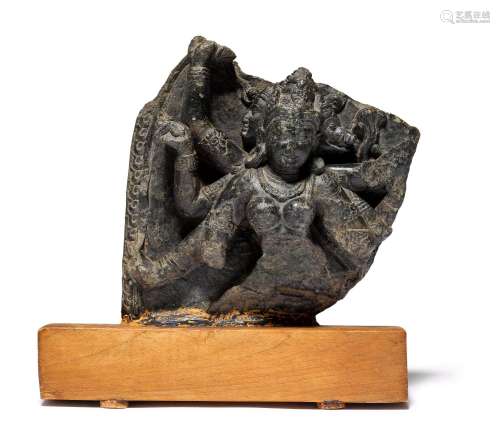 A FINE BLACK STONE SCULPTURE OF AN EIGHT-ARMED GODDESS.India...