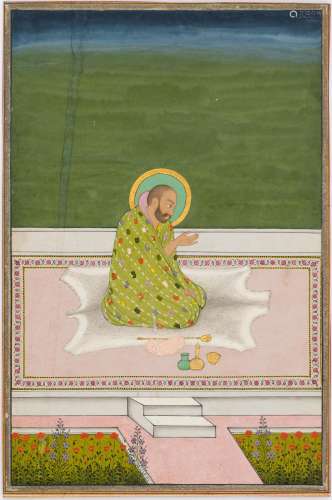 A HOLY MAN IN A PATCHWORK GARMENT.India, Deccan, around 1800...