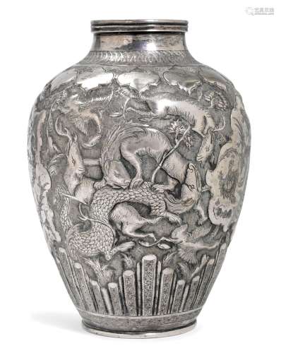 A FINE SILVER VASE WITH HUNTING SCENES.Iran, Qajar, height 2...