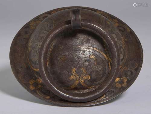 KNOB FROM A DOOR.Tibet, 17th century, D. 14.3 cm.Iron with g...