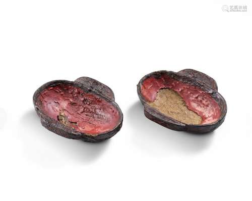 A RARE PAIR OF BLACK AND RED PAINTED LACQUER 'EAR' C...
