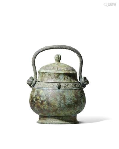 AN ARCHAIC RITUAL BRONZE WINE VESSEL AND COVER, YOU Early We...