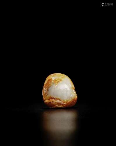 A WHITE AND RUSSET JADE 'SU DONGPO' PEBBLE CARVING 1...