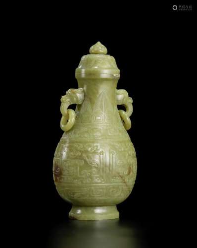 AN ARCHAISTIC YELLOW AND RUSSET JADE VASE AND COVER 19th cen...