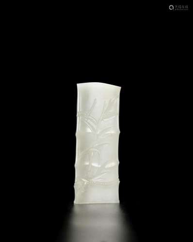 A WHITE JADE CARVED 'BAMBOO' WRISTREST 18th/19th cen...