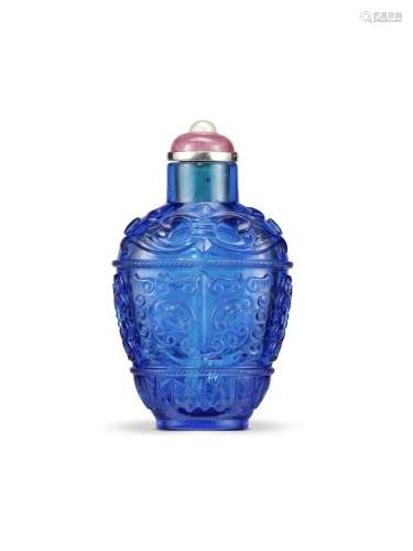AN ARCHAISTIC BLUE GLASS SNUFF BOTTLE Qianlong seal mark and...