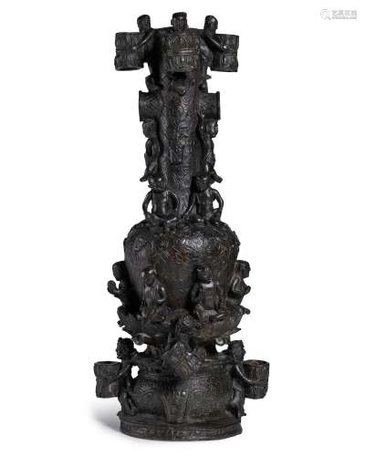 A VERY RARE AND LARGE BRONZE 'BOYS' STUPA-SHAPED ARROW VASE,...