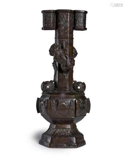 A BRONZE HEXAGONAL 'BUDDHIST LIONS' 'ARROW' VASE, TOUHU Ming...