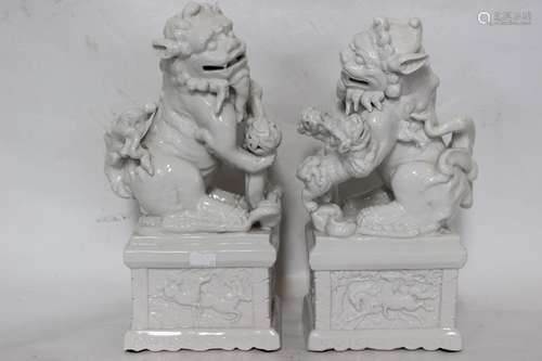 Pair of Chinse White Glazed Porcelain Lions