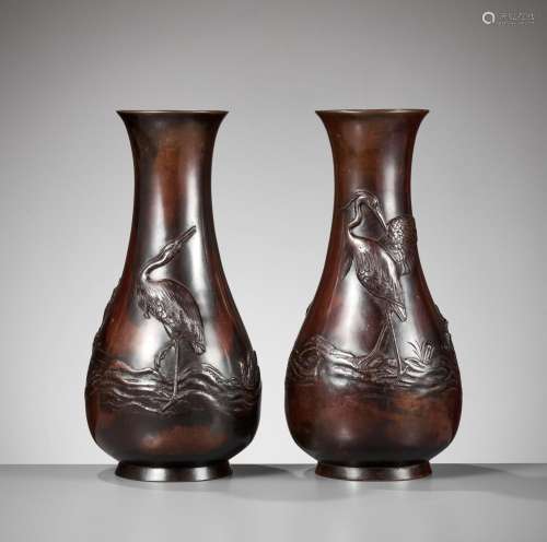 A PAIR OF BRONZE VASES DEPICTING EGRETS