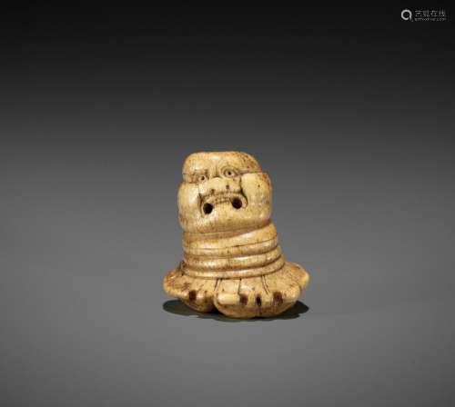A RARE STAG ANTLER ‘SILK SEAL’ TYPE NETSUKE OF A FOREIGNER