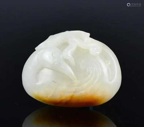 A Carved White & Russet Jade Goose Qing