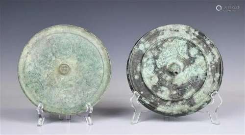 A Group of Two Archaic Bronze Mirrors