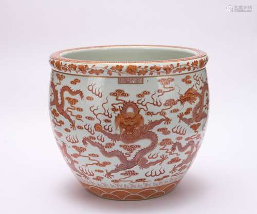 An allite red glazed 'dragon' jar painting in gold