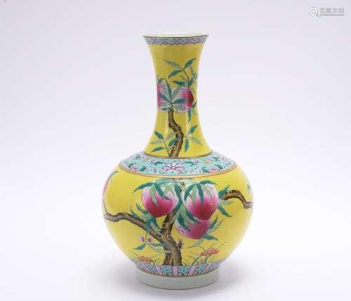 A yellow ground famille-rose 'peach' vase