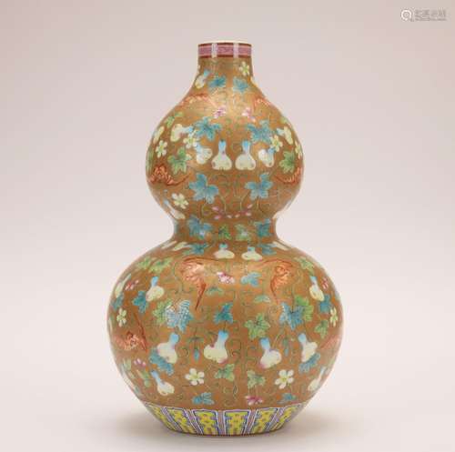 A famille-rose 'bottle gourd' gourd-shaped vase