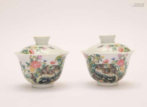 A pair of famille-rose 'floral and birds' tea-cup